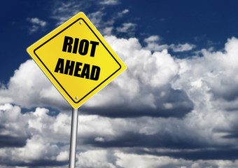 Riot ahead sign