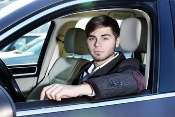 Young man in car