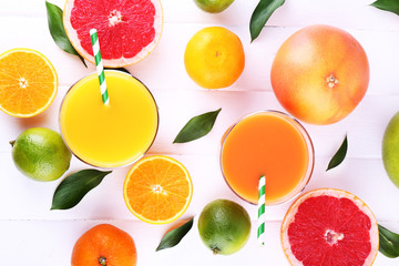 Juices and many citrus close-up