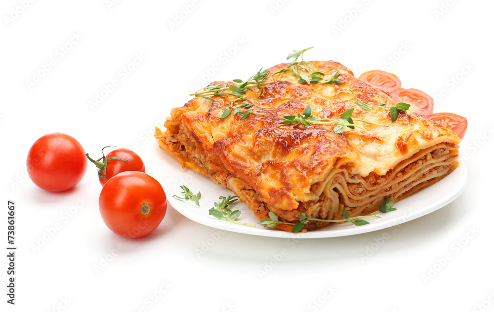 Wall mural portion of tasty lasagna, isolated on white