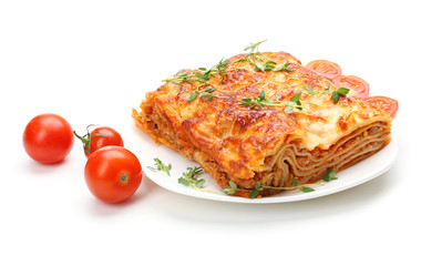 Portion of tasty lasagna, isolated on white
