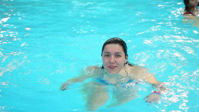 young, beautiful woman in the pool 4