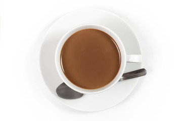 Cup of coffee with milk with spoon on white background, top view