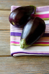 aubergine fresh and whole on a napkin