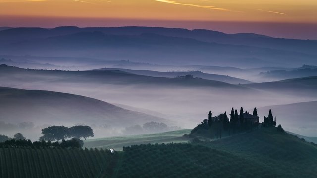 Sunrise over foggy valley in Tuscany 4k timelapse