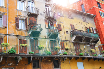 Fototapeta premium Picturesque house on the square Piazza delle Erbe on a sunny day