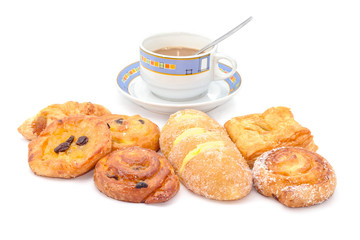 Variety of bread with coffee on white background