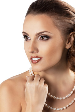 attractive beautiful woman with pearls jewerly