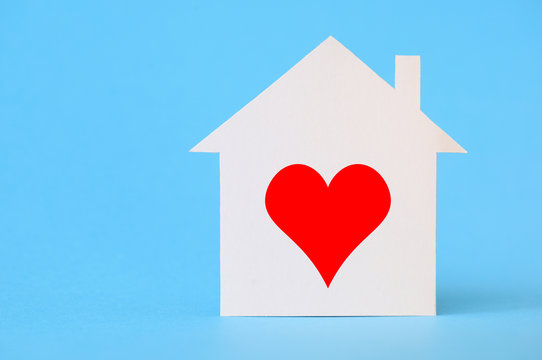 Paper house with heart shape