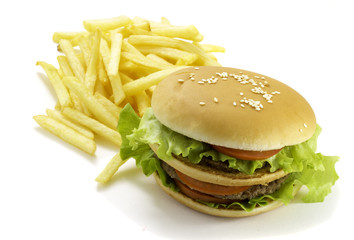 Big hamburger and fried potatoes isolated on white background