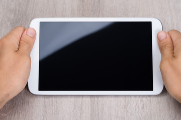 Hands Holding Smartphone