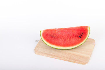 Fototapeta na wymiar Slice of watermelon on white background