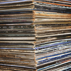 stack of vinyl records in envelopes