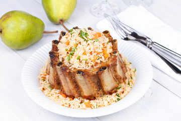 Grilled pork ribs with rice and spices