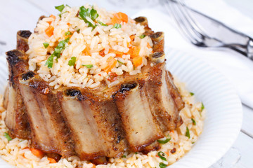 Grilled pork ribs with rice and spices