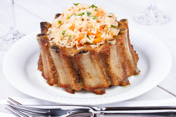 Grilled pork ribs with rice and spices