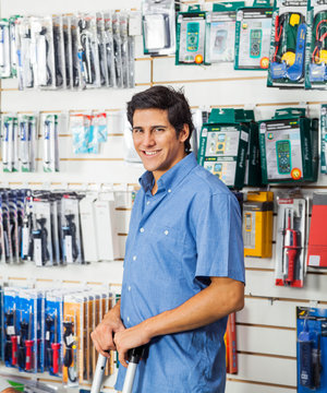 Man Standing In Hardware Store