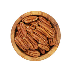 pecan nuts in wood bowl