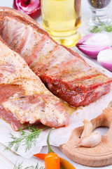 Fresh pork ribs, marinated meat prepared for roast