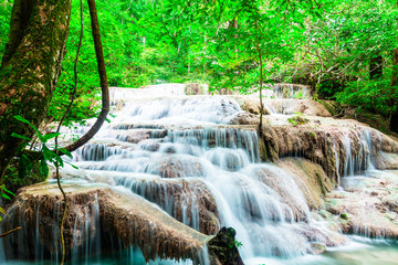 Waterfall in deep tropical forest at Erawan National Park