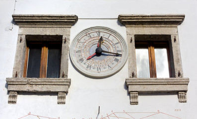 Old Stone Wall Calendar Clock in Pesariis, Italy