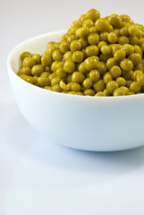 Isolated image of bowl with  peas on  white background