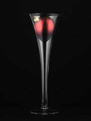 Glass of champagne and a glass Christmas ball.
