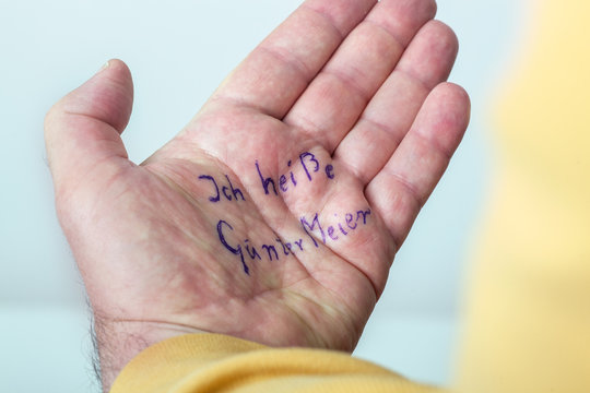 Hand of a dementia with his name