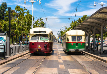 Naklejka na ściany i meble Two historic tram in San Francisco, California