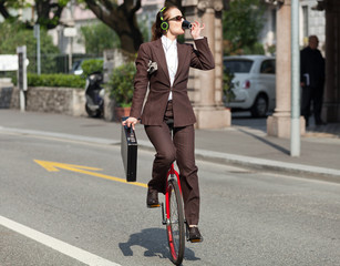 portrait of businesswoman with unicycle © alexandre zveiger