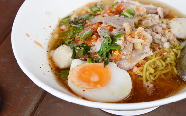 spicy noodle with slice boiled pork and topping boiled egg