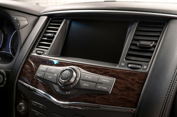 Fototapeta na wymiar Panel of a modern car. Screen multimedia system.