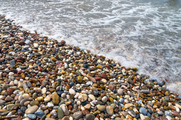 Colored pebbles on the beach