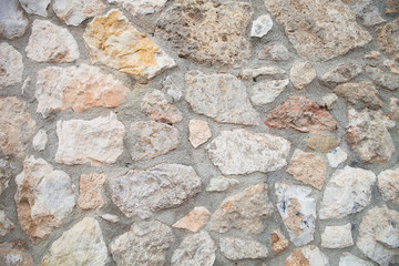 Wall built of natural stone