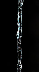 Obraz na płótnie Canvas water on a black background