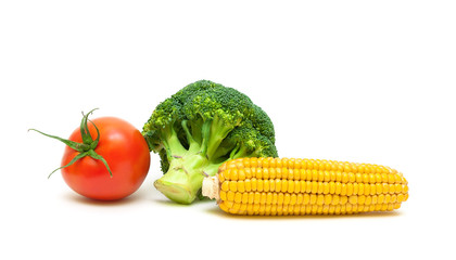 corn, broccoli and ripe tomatoes isolated on white background