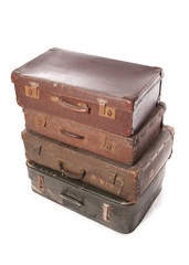 Stack of vintage suit cases