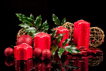 Christmas candles on a black background