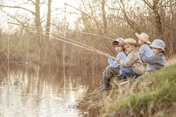 Fotobehang Boys fishing on the lake © Alexandr Vasilyev