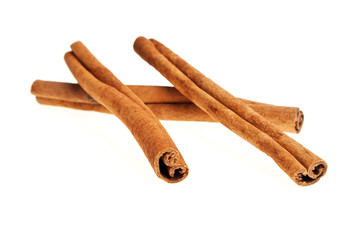 Cinnamon sticks on a white background