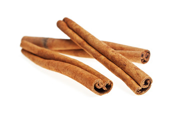 Cinnamon sticks on a white background