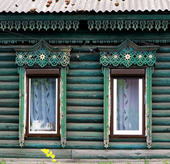 Wooden window with shutter doors.