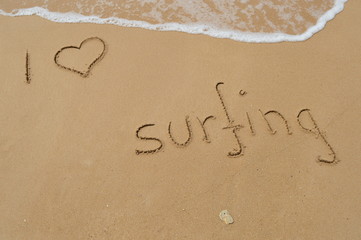 Writing 'I love surfing'