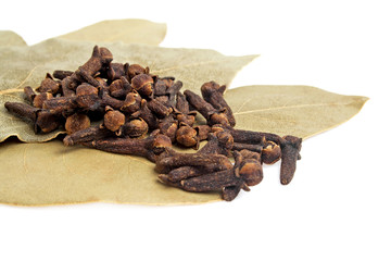 Fototapeta premium Bay leaves and carnation isolated on white background