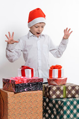 boy with christmas present boxes