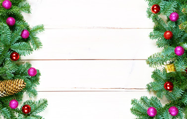 Fototapeta na wymiar Christmas background with spruce tree and christmas balls on tab