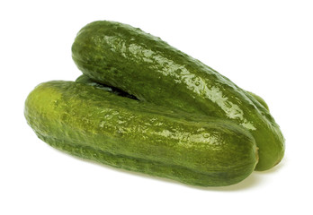Pickled cucumbers on white background