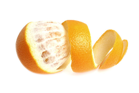 Orange with peeled spiral skin isolated on white background