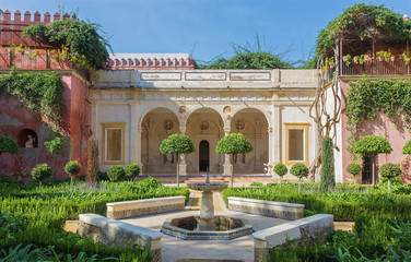 Seville - The facade and gardens of Casa de Pilatos.