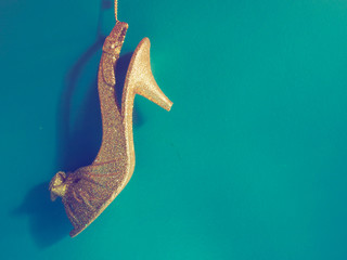 vintage toy red shoes on the blue background vintage color